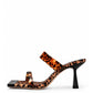 Leopard-print leather and silicone strap heels, side view