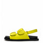 Lime green soft leather double-strap sandals with black sole, side view