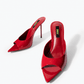 Red patent leather stiletto mules, front angle