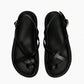 Top view of black genuine leather toe-loop sandals with crossed straps