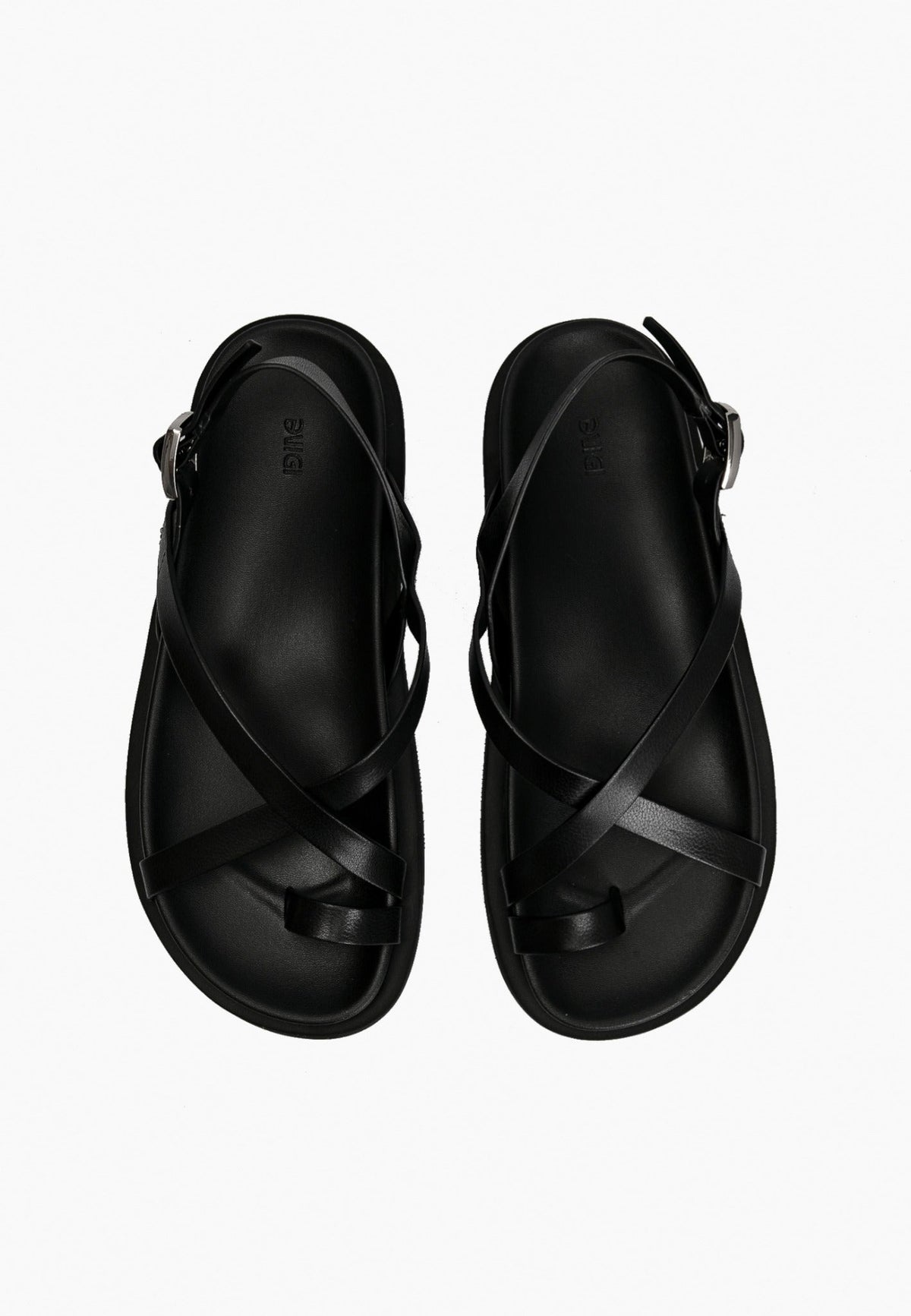 Top view of black genuine leather toe-loop sandals with crossed straps